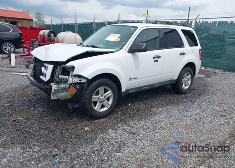 2011 Ford Escape Hybrid z USA, uszkodzony, nr VIN 1FMCU5K35BKB92993